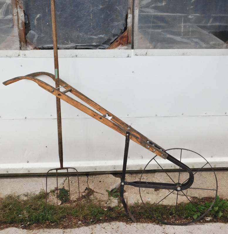 lot 210 image: vintage pitchfork and high wheel cultivator