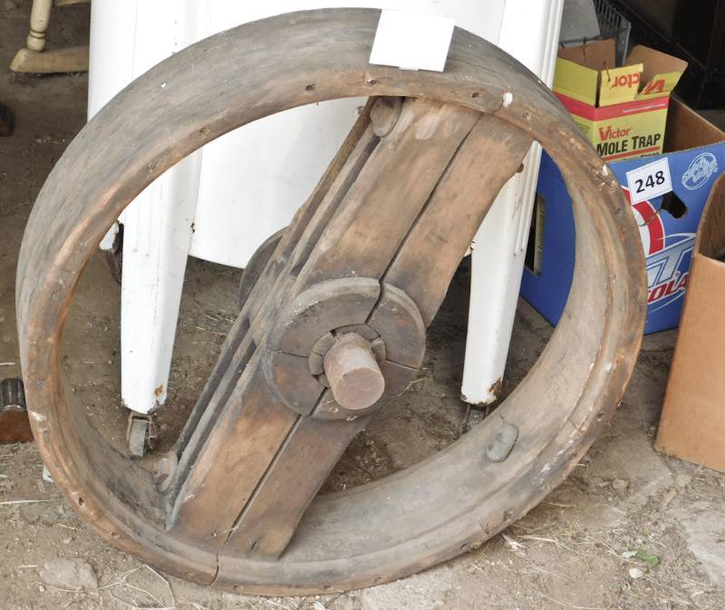 lot 240 image: large diameter wooden grainery pulley