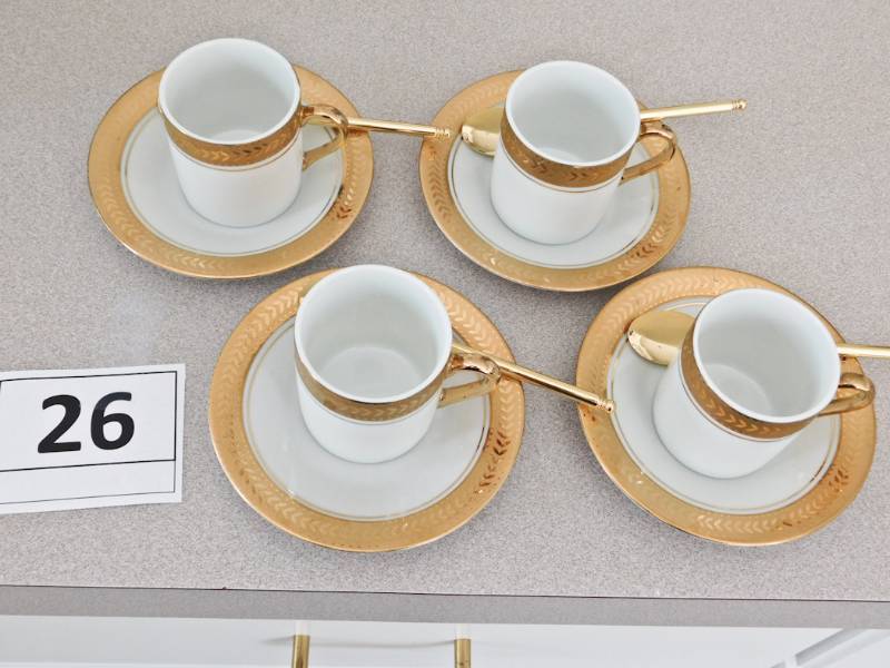 lot 26 image: Flat Demitasse Cup, saucer and gold spoon