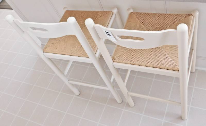 lot 28 image: 2 newer barstools cane seats
