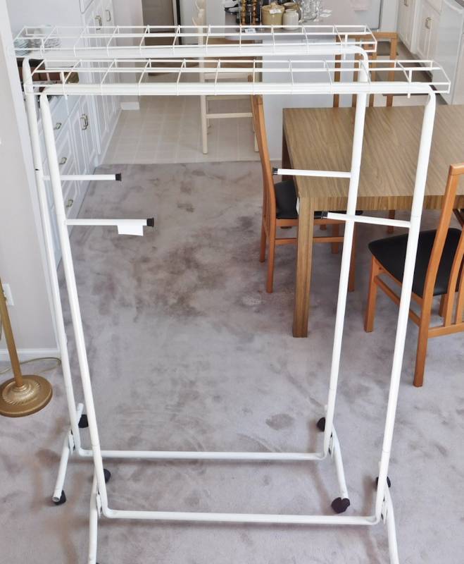 lot 29 image: 2 clothing racks with wheels