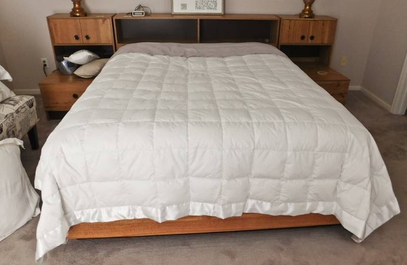 lot 46 image: queen bed with and alarm clock