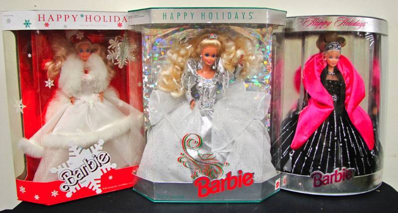 lot 102 image: 3 Holiday Barbies in Original box