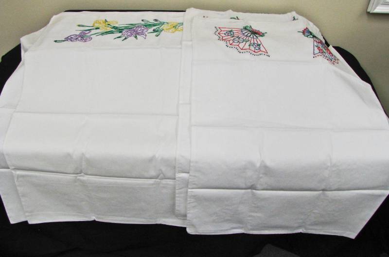 lot 104 image: set of embroidered pillow cases