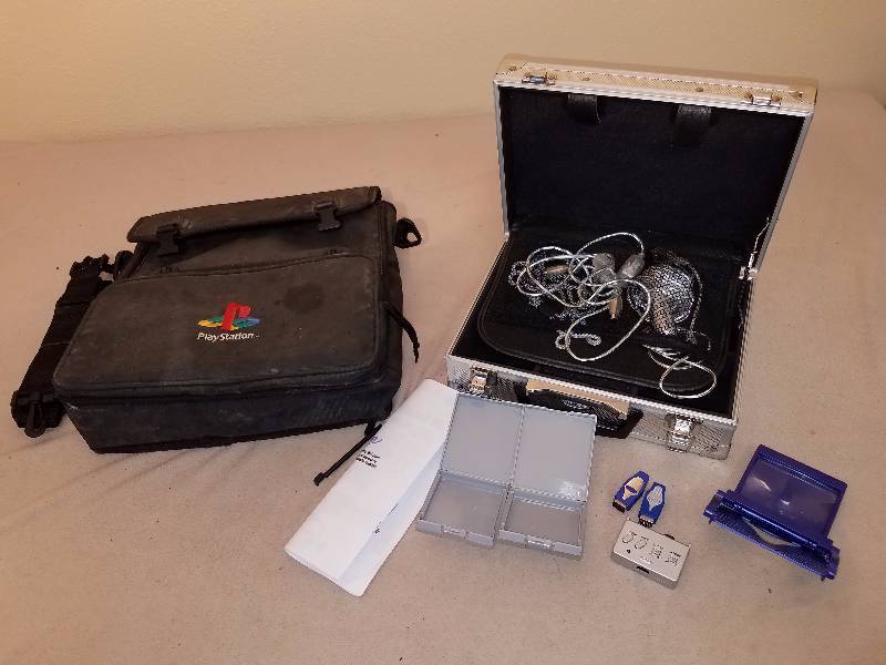 lot 89 image: PlayStation Bag and Game Box Case