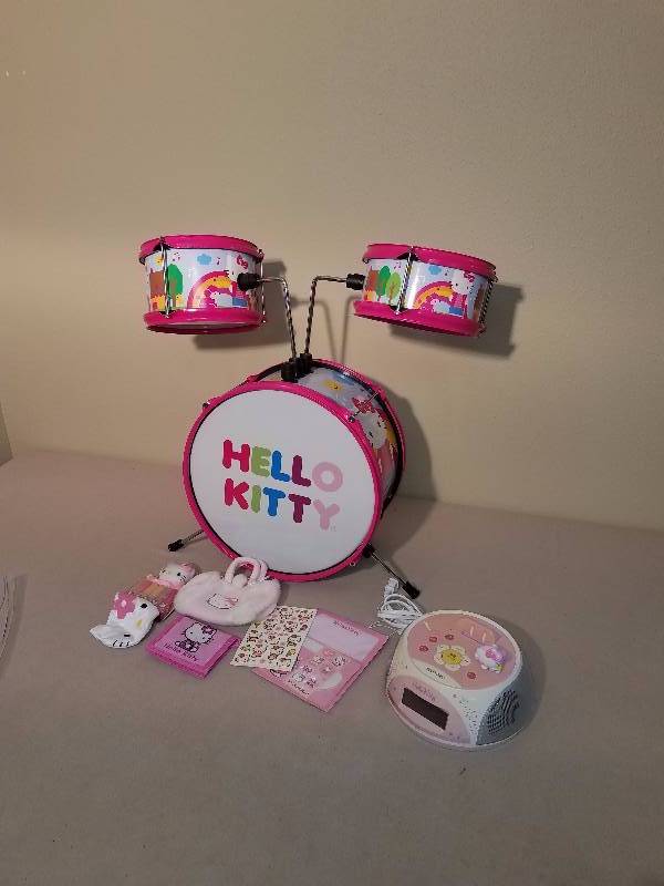 lot 100 image: Hello Kitty Drum Set with Extra