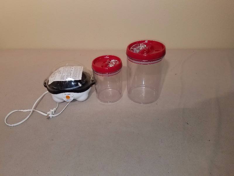 lot 121 image: 2 Felli Plastic Air tight Containers and West Bend Egg Cooker
