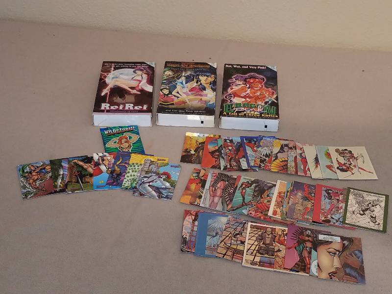 lot 157 image: Anime VHS Tapes and Anime Fantasy Trading Cards