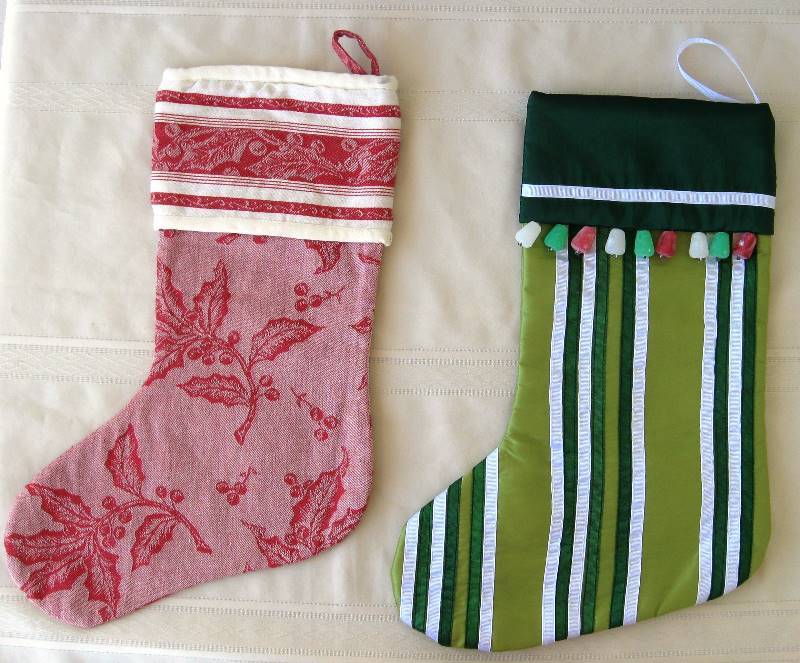 lot 027 image: 3 Full Size Christmas Stockings & foil holiday decor