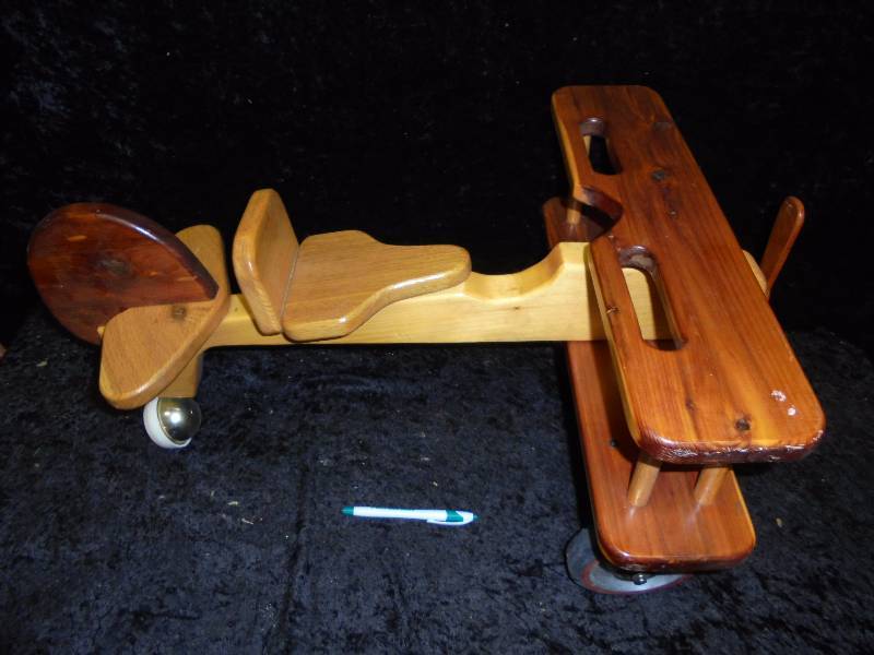 lot 17 image: Childs Ride On Wood Airplane