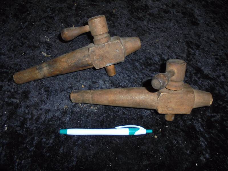lot 76 image: Pair - Wood Barrell Tappers