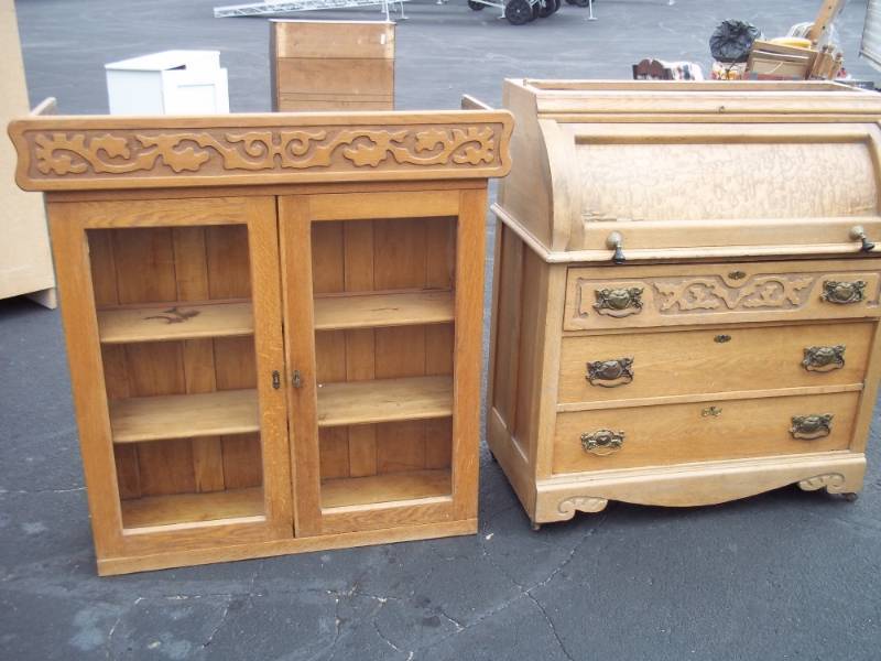 Antique 2 piece desk, roll top with 3 drawer and 3 shelf glass cabinet with key, top piece has been refinished bottom has not bottom is 38 x 19 x 34, top is 39 x 12 x 43