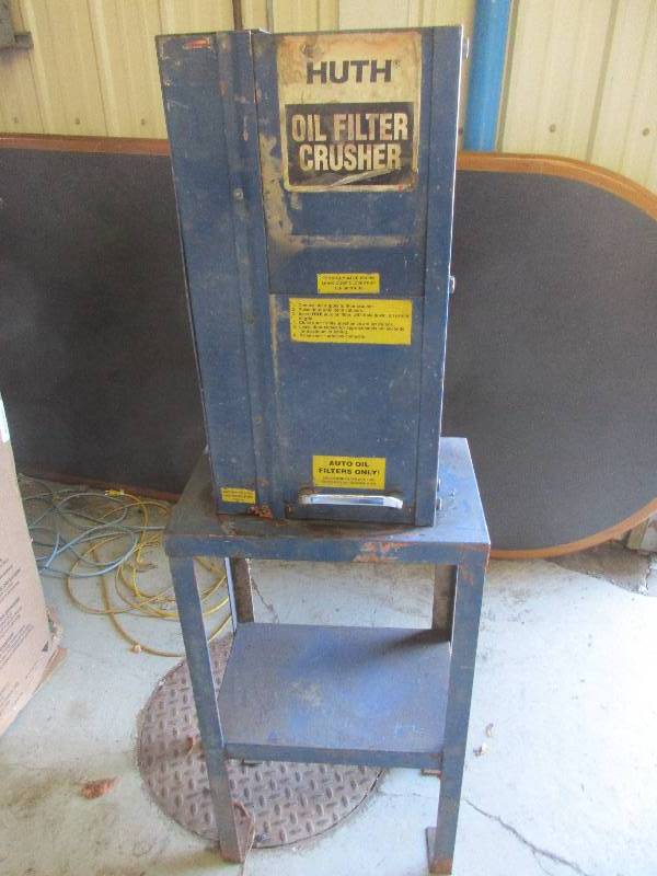 lot 44 image: Huth oil filter crusher