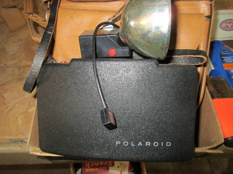 lot 94 image: Polaroid cameras and misc toys