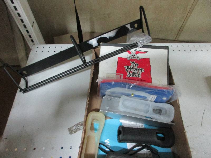 lot 100 image: WII remote and 4 rubber covers, w other misc items