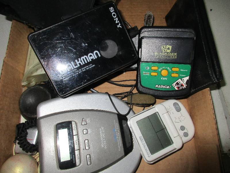 lot 103 image: Walkman, antenna and handheld game