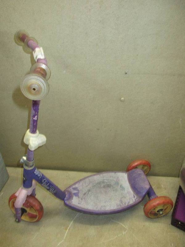 lot 204 image: tinker bell scooter and frisher price walker