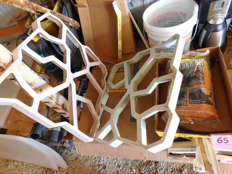 lot 65 image: bag of stakes, 2 concrete molds hose and sprayer