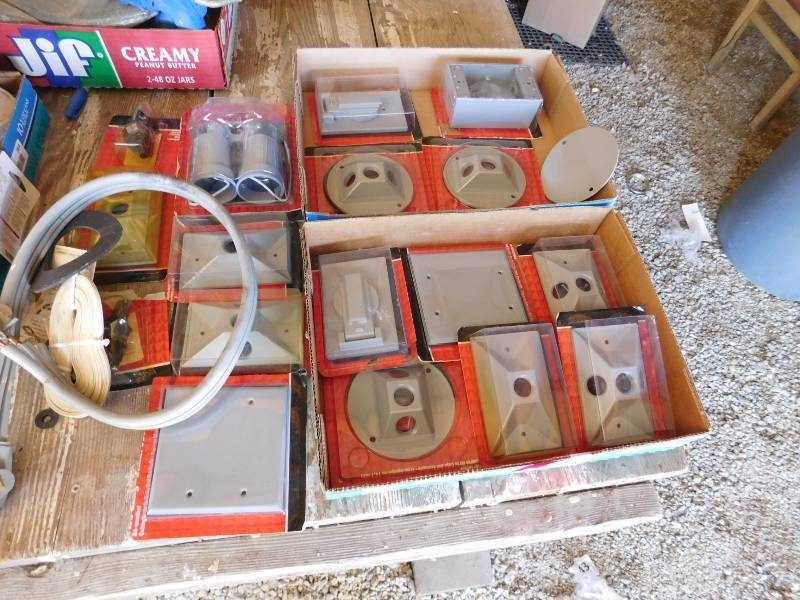 lot 71 image: several NIB electrical plates