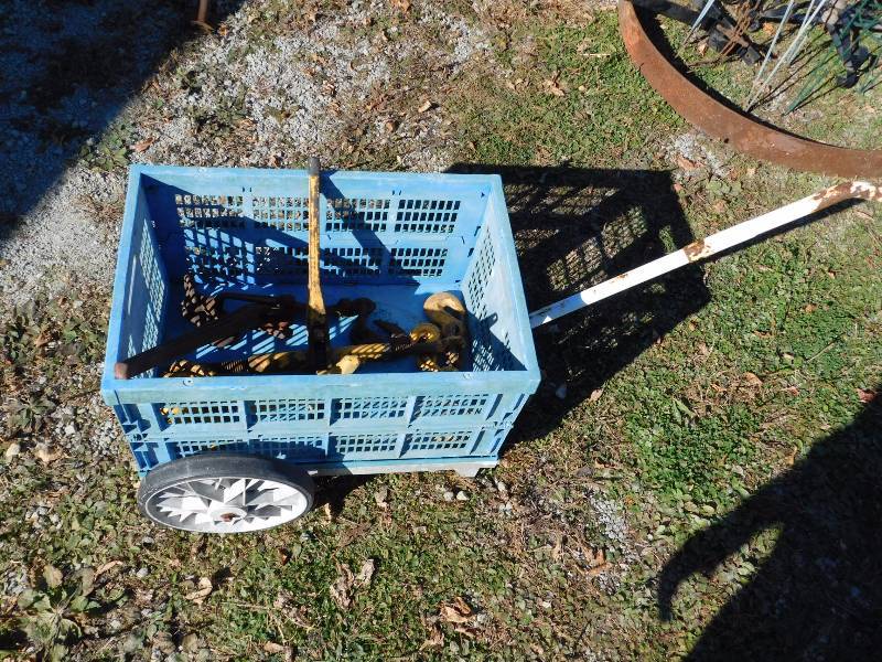 lot 101 image: wagon with cast iron chain tools