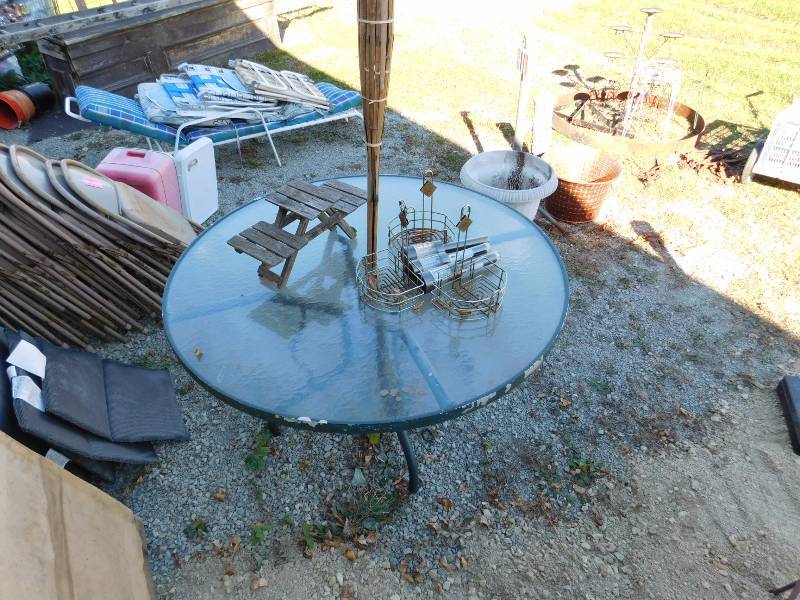 lot 104 image: outdoor patio table and items on top