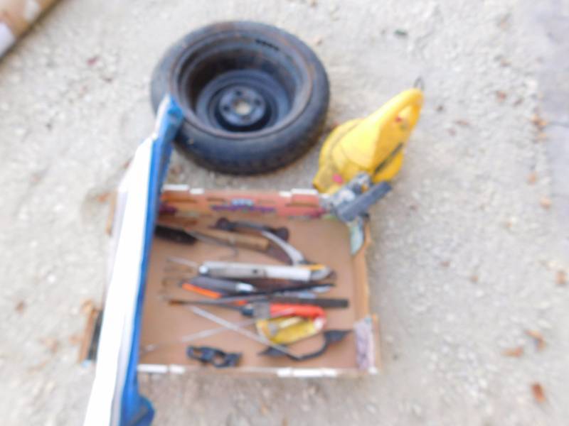 lot 108 image: spare tire and tools
