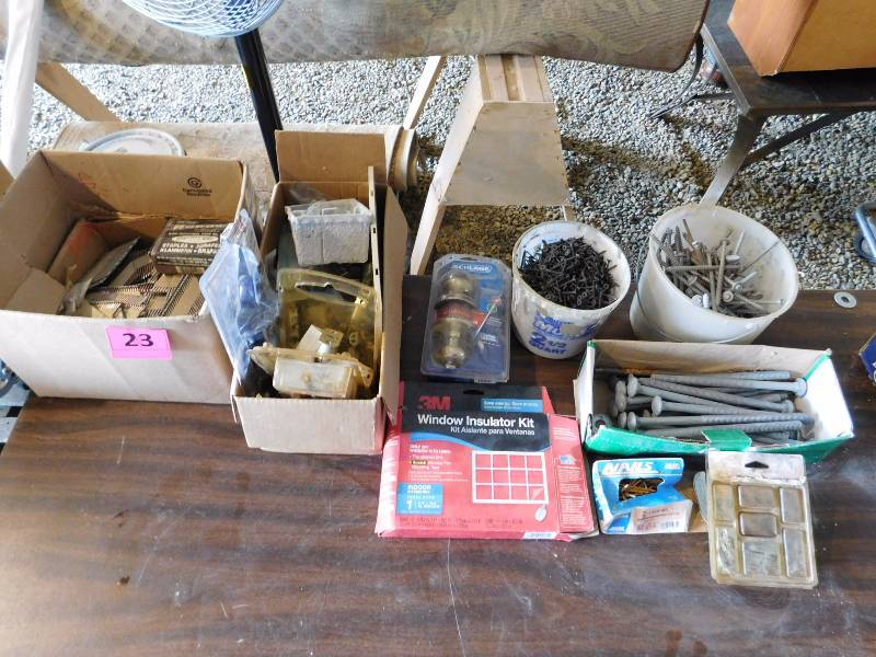 lot 23 image: nail gun nails, misc hardware