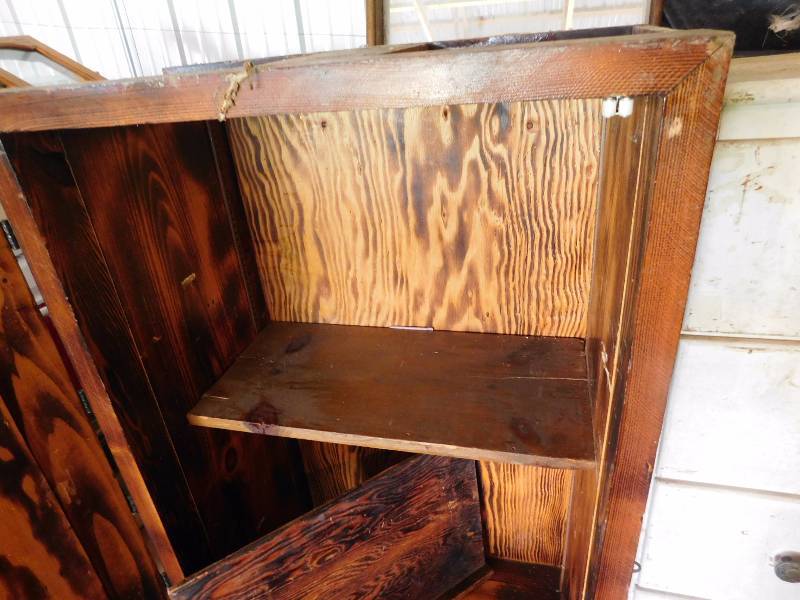 lot 33 image: large wooden pantry like cabinet door and shelves