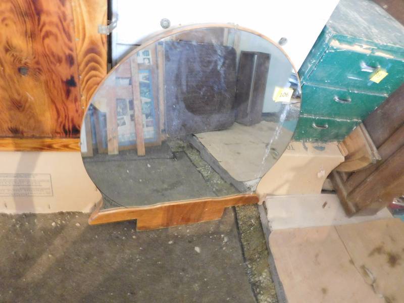lot 36 image: round mirror from a vintage vanity
