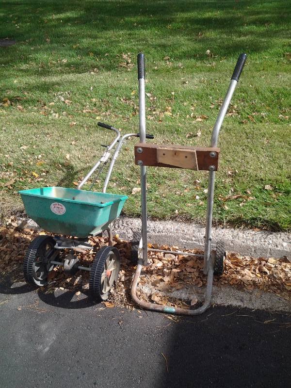 lot 23 image: Broadcast Fertilizer Spreader & Outboard Motor Stand