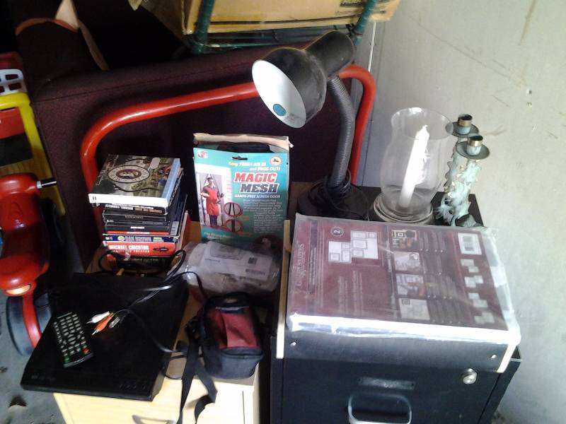 lot 29 image: DVD Player With Remote, Audio Books, Desk Light, Candle Holders, Misc