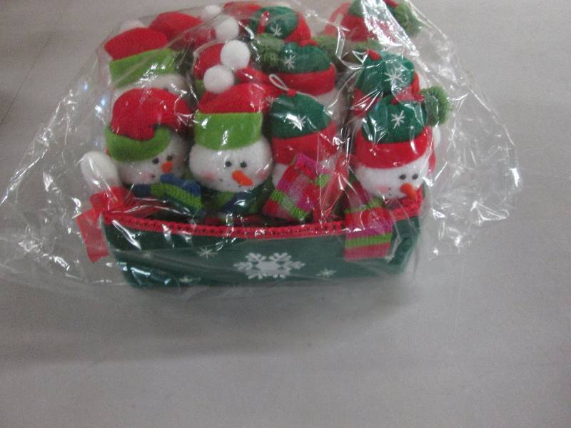 12 Snowmen Ornaments in a Green Fel...