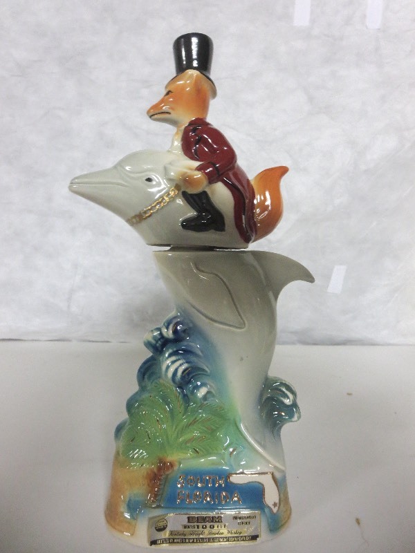 lot 15 image: Fox Riding Dolphin