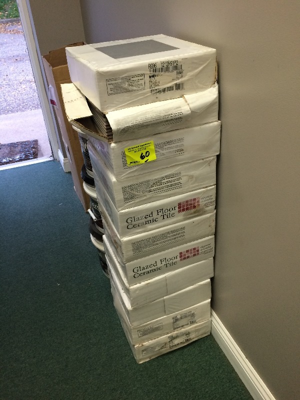 lot 60 image: Glazed Floor Ceramic Tile  10 boxes  (3) 5 gallon (partial cans) of adhesive   View all pictures for more details