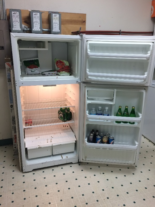 lot 77 image: Hotpoint Refrigerator  Freezer   est  17 cu ft    Runs - cools and freezes.  Bring your own help and dolly
