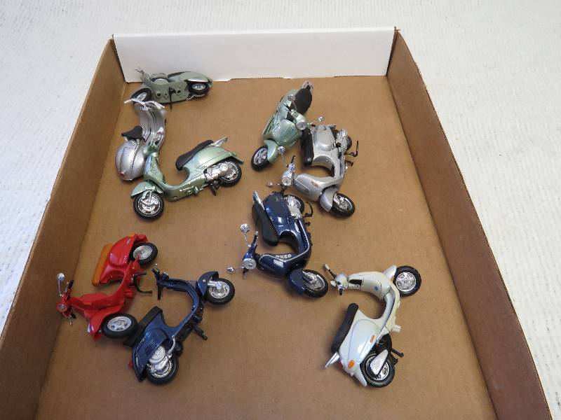 lot 114 image: Scooters