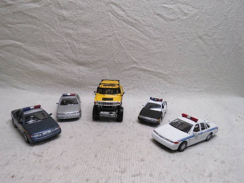 lot 409 image: Police cars and more