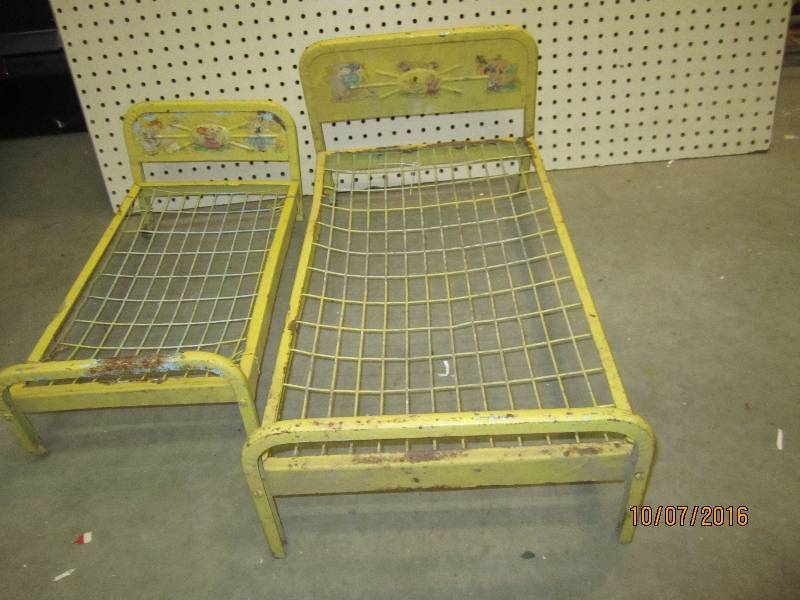 2 metal frame doll beds...