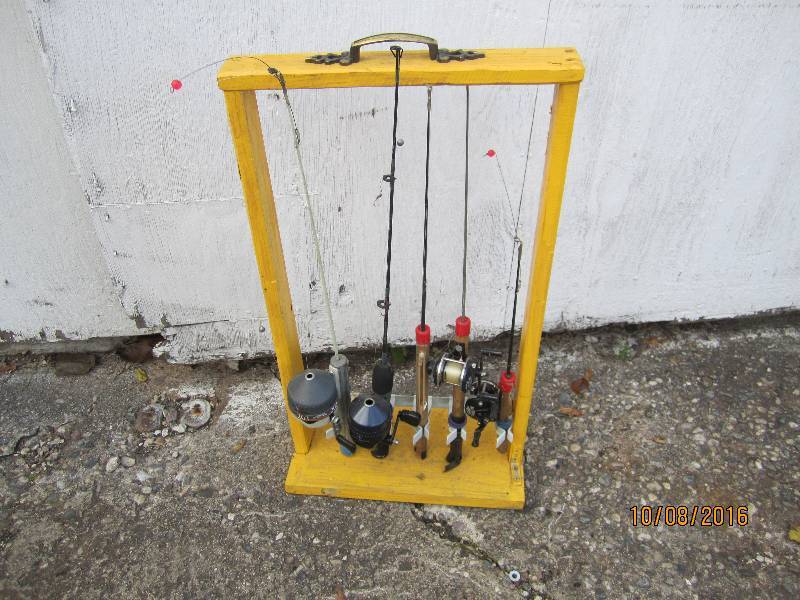 Ice fishing poles in stand...