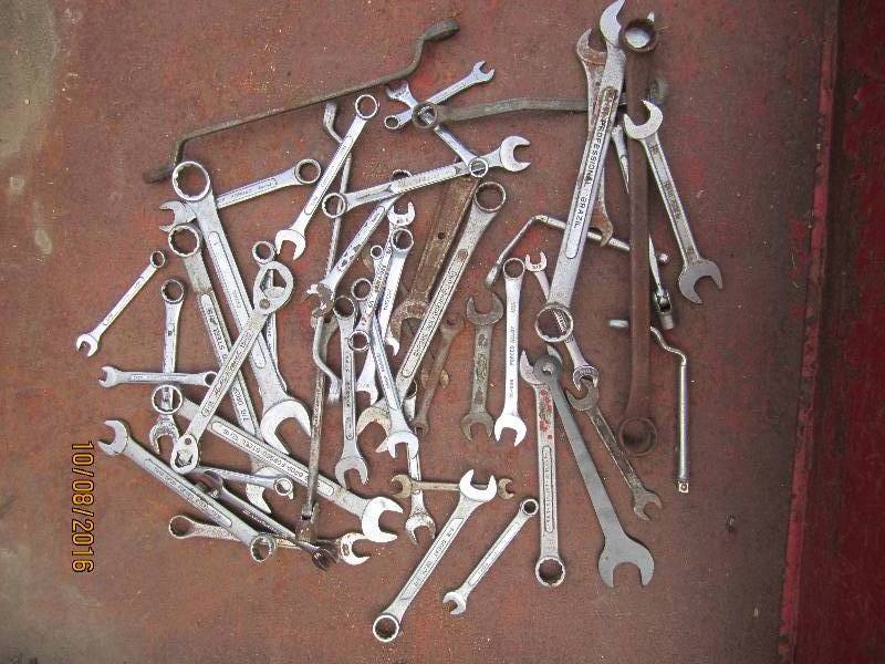 Lot of wrenches and pliers and cutt...