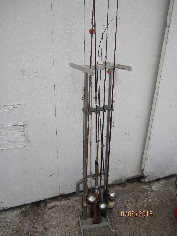 Cabellas fishing rod stand filled ...