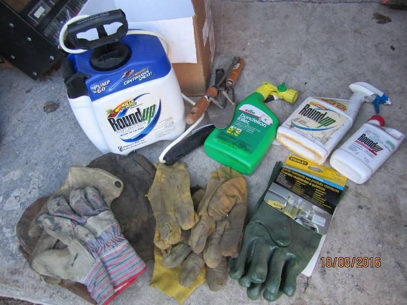 Lot of gloves and lawn chemicals...