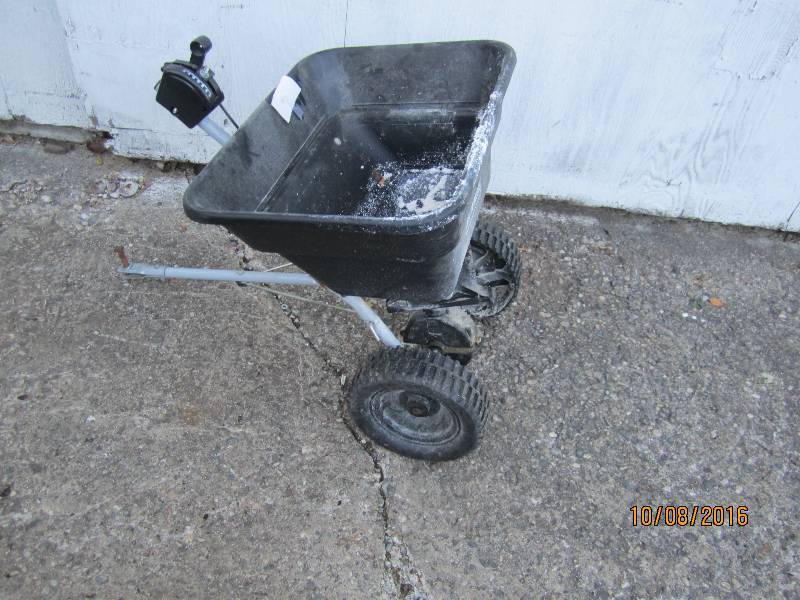 Pull behind spreader...