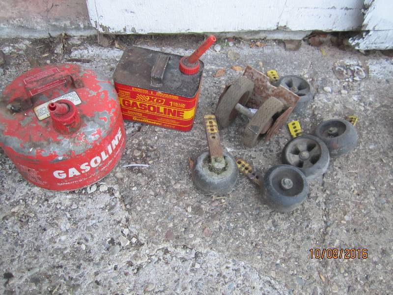 Lawn mower deck wheels and gas cans...
