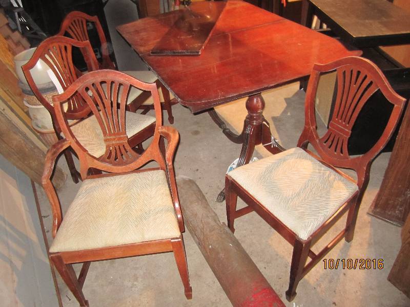 Wood table with 1 captain and 3 reg...