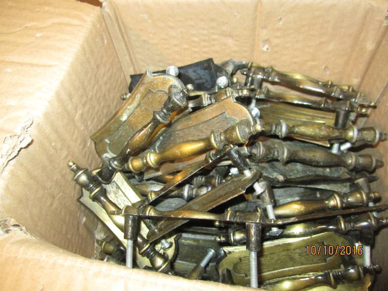 Box filled with cabinet handles...