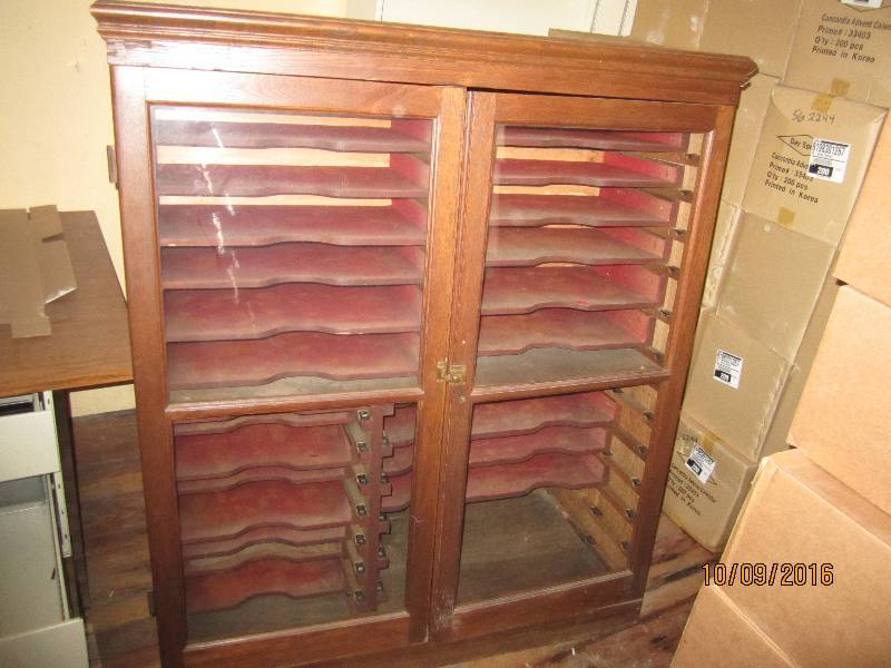Vintage glass front display with sl...