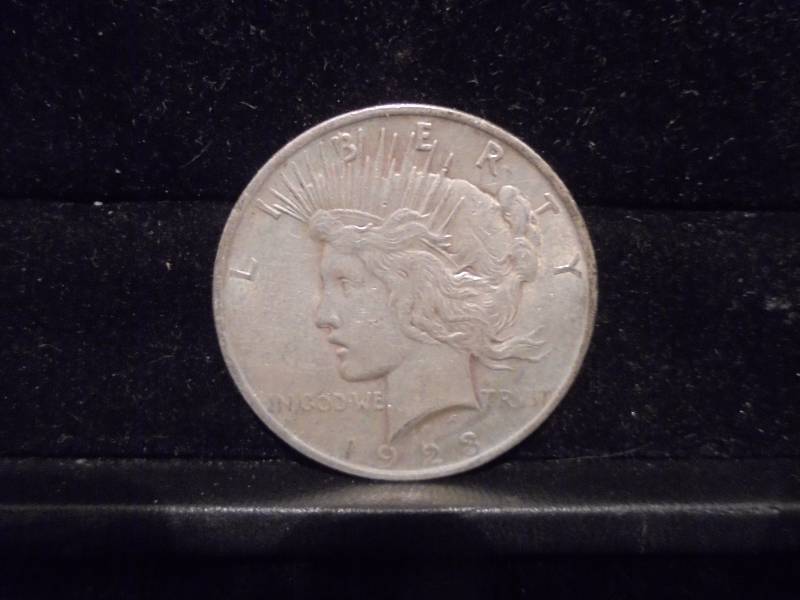 lot 16 image: 1923 Peace Silver Dollar, 90% Silver