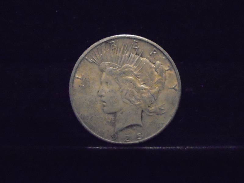 lot 18 image: 1925 Peace Silver Dollar, 90% Silver
