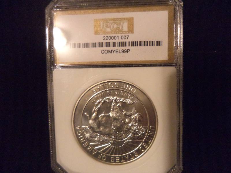 lot 65 image: 1999P  Yellowstone Commemorative Silver Dollar, 90% Silver